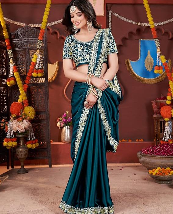 Women's Elegant Designer Sarees Premium Rangoli Fabric with Embellished Border, Lightweight and Stylish Ethnic Wear - Perfect for Parties, Weddings, and Festive Occasions..